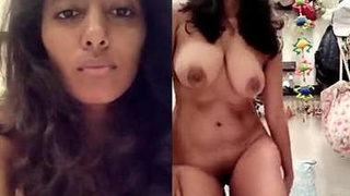 Indian girl with massive breasts performs on camera