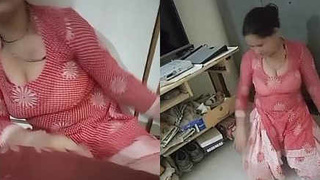 Cleaning lady flaunts her assets while doing chores