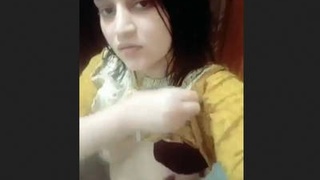 Watch a sexy teen with nice tits in action