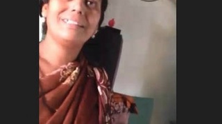 Desi Aunty's big boobs on display in a village