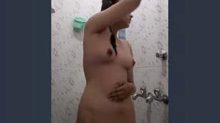 Desi girl takes a bath in the bathroom
