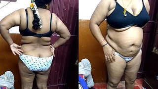 Fatty aunty flaunts her curves in a solo video