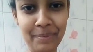 Indian girl unhooks bra for solo nude selfies