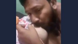 Desi couple enjoys sucking boobs in steamy video