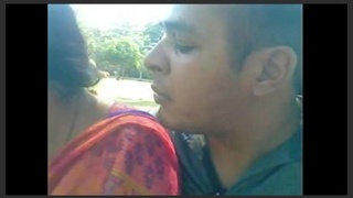 Indian couple shares a passionate moment in the park