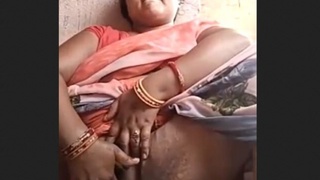 Rural Indian bhabi masturbates with her fingers