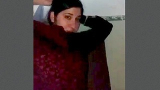 A bhabi with a nice body gets naughty in this video