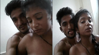 Desi couple's intimate selfie video with topless girl kissing her boyfriend