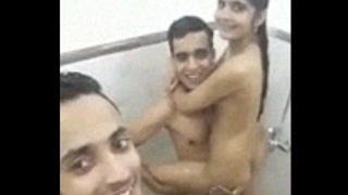 Indian twins indulge in steamy threesome with girl in bathroom
