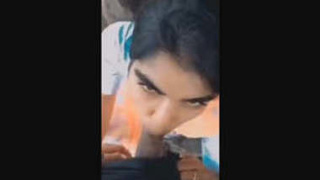 Cute Indian girl gives a blowjob in the outdoors