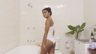 Rhea, an Indian teen, indulges in solo play in the bathtub