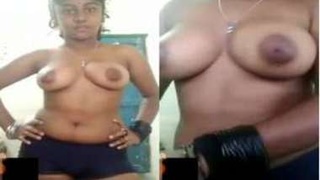 Indian desi woman uncovers her big breasts for online viewers