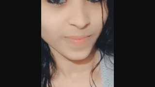 Cute Indian girl gets naughty in steamy video