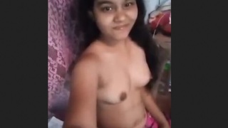 Cute young girl from India displays her assets