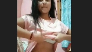 Watch a cute Desi webcam girl flaunt her big boobs in a revealing show
