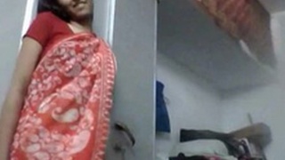 Young and horny girl in a saree performs striptease for money