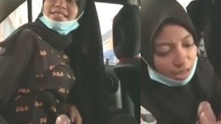 Desi hijabi teen gives a blowjob and gets fucked in the back seat of a car
