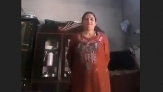 Pakistani woman unveils her ample bosom and intimate area