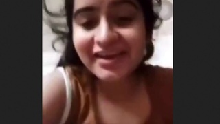 Watch a hot babe flaunt her huge boobs in a video call