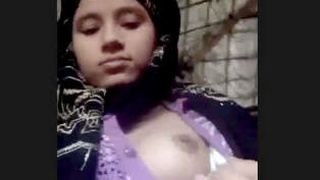 Indian babe displays her tight boobs and pink pussy