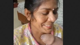 Mature Indian housewife gives a blowjob